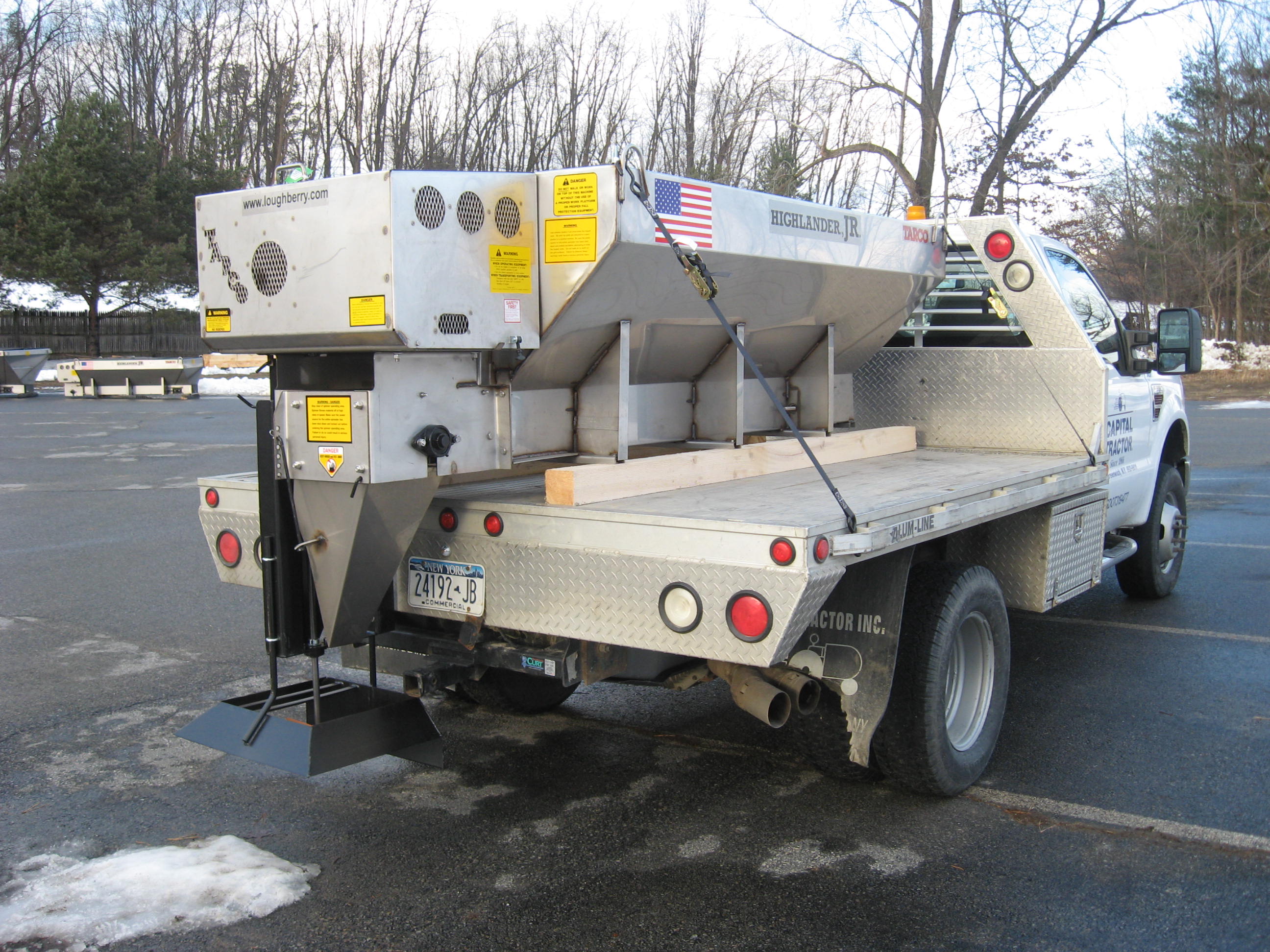All season dump bodies, tire recycling machines, vacuum leaf loader boxes, salt and sand spreaders, v-box spreaders, and other municipal equipment manufactured by Loughberry Mfg. Corp. under the Tarco brand.